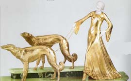 41M Gori Dama con galgos. 74x52cm. Patina oro